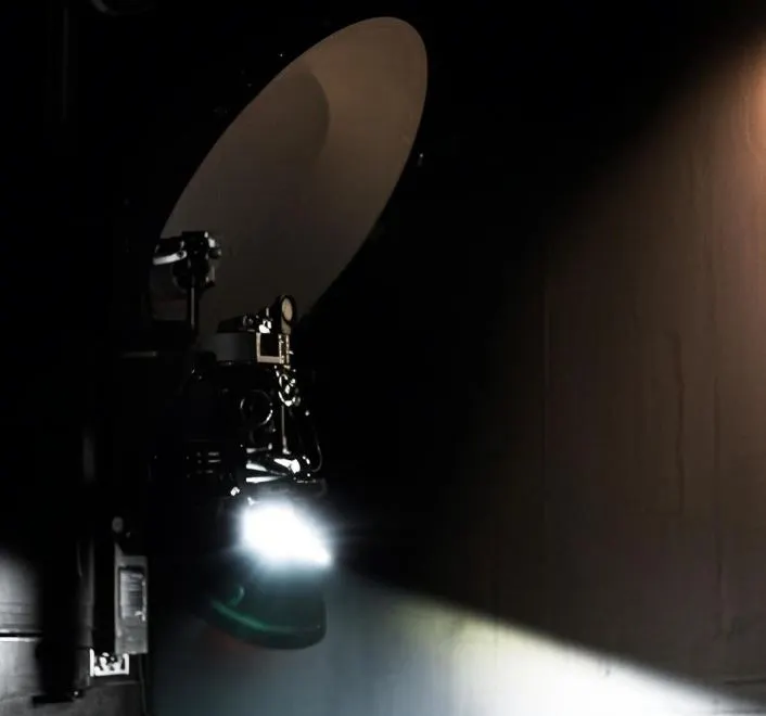 Automotive headlight photometric testing in dark room